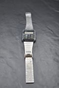 A 1980's Casio CA-501 digital calculator watch no: 327026
