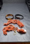 Four vintage branch coral necklaces, an Indian style bangle and a horn serpent bangle