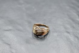 A 9ct gold domed band ring having open decoration, size L & approxc 2.8g