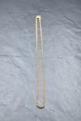 A yellow metal double link belcher chain bearing plaque stamped 9C, approx 16' & 4.2g