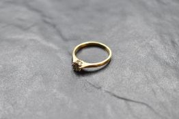 A diamond solitaire ring, having a brilliant cut diamond, approx 0.4ct in a raised claw set mount on