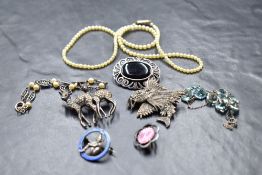 A small selection of silver jewellery including a necklace with blue paste stones, a silver and