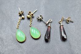 Two pairs of 9ct gold/yellow metal drop earrings for pierced ears, one pair having chain