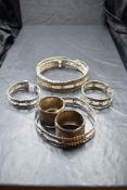 A selection of Zambian white metal bracelets and necklaces of traditional style and two white