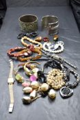 A selection of jewellery including white metal cuff bangle, ethnic style bangle, hematite