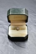 An opal and diamond cluster ring on an 18ct gold loop, size N & approx 3.6g