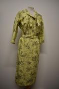 A 1950s Horrockses cotton day dress, having pussy bow, 3/4 sleeves and matching belt.