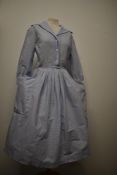 A 1950s Horrockses cotton day dress, having checked pattern with contrasting collar and cuffs,