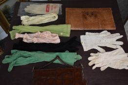 Two vintage handbags, one alligator with clasp fastening and the other a snakeskin clutch, also