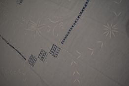 A 19th century white bed sheet, having extensive embroidery and drawn thread work.
