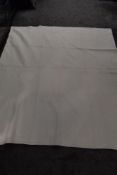 An antique cream Durham quilt, having rare thistle design, with minute hand stitching throughout.