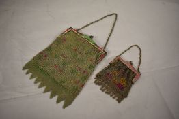 An early 20th century chain bag, having painted frame and clasp fastening with blue gem stone