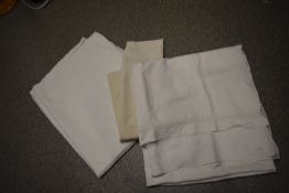 An antique drawn thread work bed sheet, around a king or large double in size and two more vintage