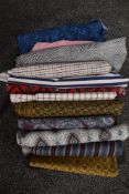 A box of vintage dress making fabrics.