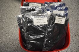 Fifteen vintage childrens blue and black leotards, new in packaging.