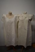 An antique shift having monogrammed initials 'M R' and a smock of heavier weight fabric, possibly
