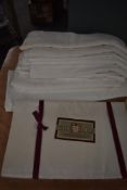 A selection of vintage and antique damask table cloths.