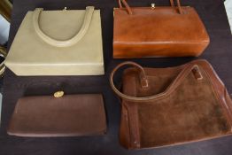 Three vintage framed bags with clasp fastenings and a clutch bag.