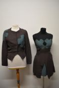 An unusual late 40/ 50s two piece set in grey crepe with teal cross design, comprising jacket with