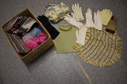 A mixed lot of vintage headscarves, gloves, a knitted modesty panel , tights and more.