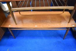 A vintage coffee table having teak top, approx 131 x 51cm