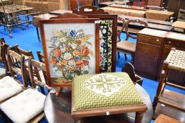 Two tapestry firescreens and a similar footstool