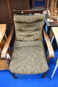 A 1920s oak armchair bearing plaque for Mr N Whitehead, Shap Post Office