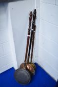 Three traditional warming pans