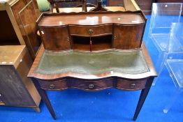 A reproduction regency style ladies desk