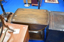 A dark stained Ercol tea trolley