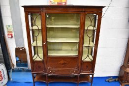 An Edwardian mahogany and inlaid display cabinet