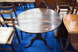A 19th Century oak pedestal table