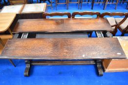 A vintage oak 'surprise' table having pop up central leaf