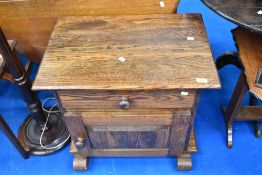 A traditional oak side cabinet