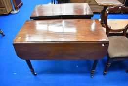 A Regency mahogany Pembroke table in the Gillows style having reeded legs