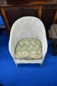 A vintage Lloyd Loom tub chair