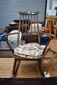 A traditional Ercol rocking armchair (dark stain)