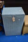 A vintage Lloyd loom linen basket of tall proportions