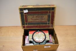 A model A35 Simplex tin typewriter, having original box.