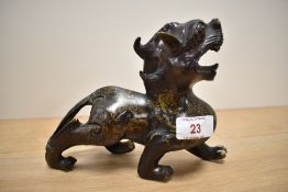 A 20th century Chinese bronze kylin study.