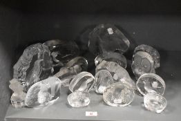 A collection of paperweights, including Wedgwood and Mats Jonasson, of animal and bird interest.