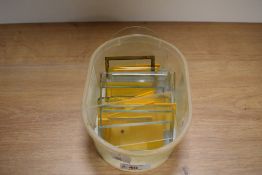 A box of glass panels for carriage clocks.
