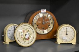 A selection of vintage clocks, including two Smiths mid century tin alarm clocks and Art Deco mantel