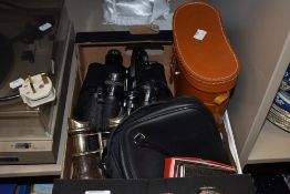 Three sets of binoculars including early 20th century set, Tasco and Proloisirs and two sets of