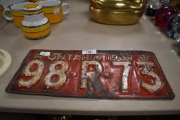 A vintage number plate,'Ontario 1937 98.R.73'.