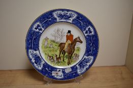 A Wedgwood plate having transfer pattern of hunting scene with hand painted details, 'Master of
