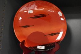 An African sky Poole pottery plate.