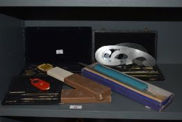 A collection of Draughtsmens sets and measures, most with boxes.