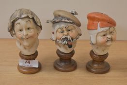 Three Capodimonte busts stood on wood plinths.