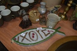 A collection of studio pottery, including fish shaped plaque, honey pot with bee to lid, vase etc.